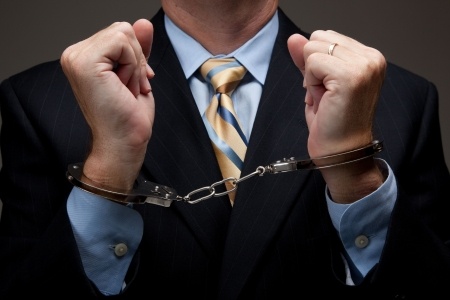 Sales Agent in Handcuffs