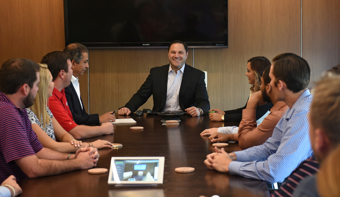 Mark Cerminaro at Head of Table at RapidAdvance for deBanked Magazine