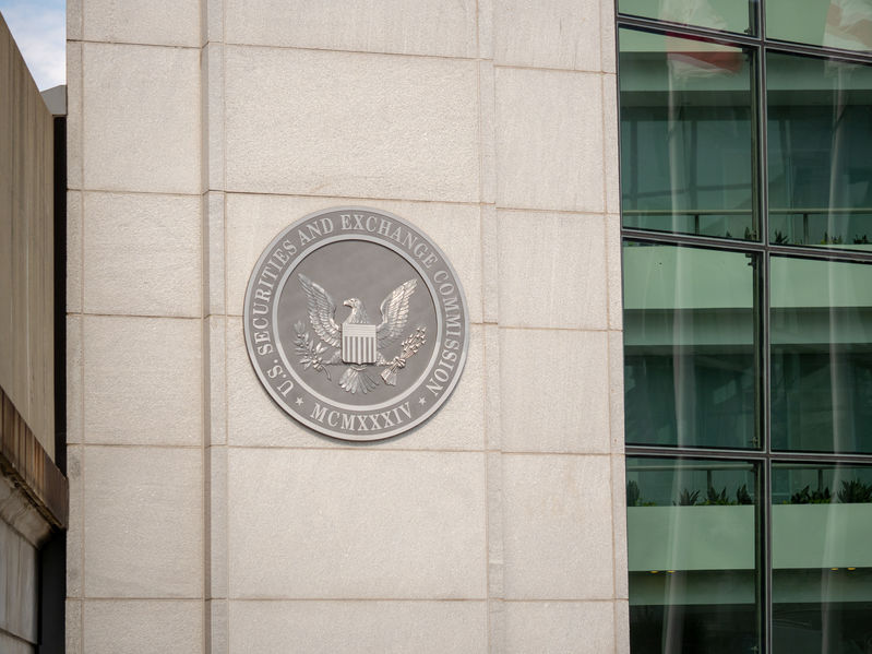 United States Securities and Exchange commission SEC logo on entrance of DC building near H street